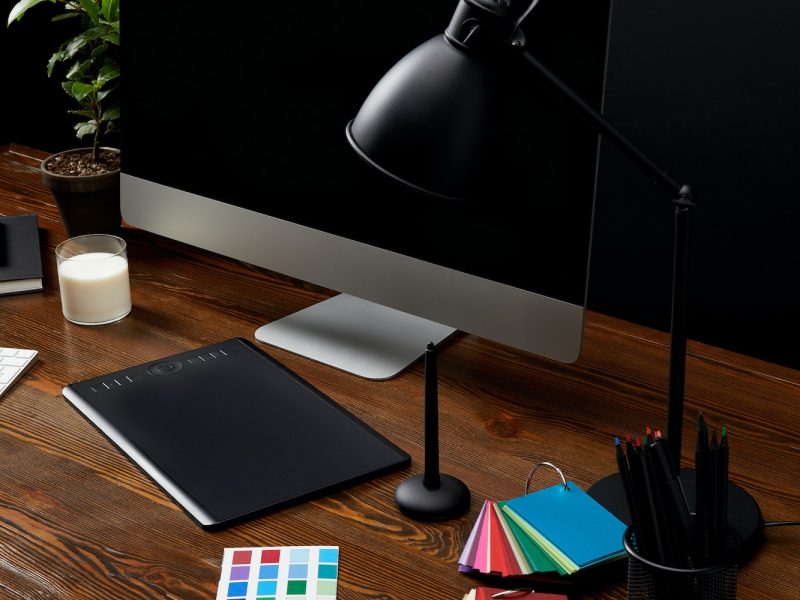 close-up-view-of-graphic-designer-workplace-with-colorful-pallet-graphic-tablet-blank-computer.jpg